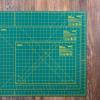 Olfa 18'' Wide x 12'' Long x 1.5mm Thick Double-Side Green Rotary Cutting Mat w/ Measuring Marks